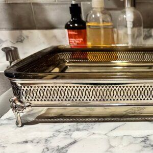 Vintage Pyrex casserole dish with silver-plated serving caddy